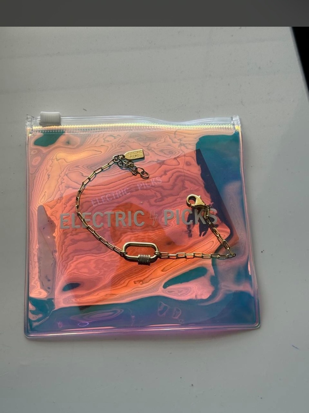Electric Picks Gold Bracelet never used comes with pouch